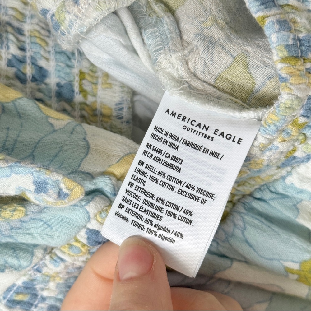 AMERICAN EAGLE | FLORAL 70s BEACH RUFFLE BOW ROMPER - Picture 11 of 11